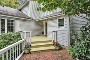 Rare opportunity to own this fabulous 4 bedroom home with spectacular grounds across the street from a private golf course.
