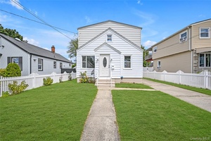 This beautifully renovated home offers 4 bedrooms, a modern kitchen with stainless steel appliances, stylish new flooring, and 2 new bathrooms.