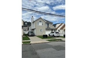 Legal Two Family Home, in the Heart of Long Beach, offering everything you could want in a coastal residence bright and open layout, down the block from the boardwalk and ...
