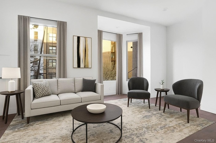 Living room featuring wood finished floors and baseboards