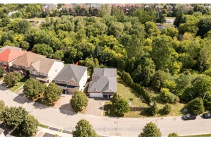 Rarely Offered Bungalow on a Stunning 91 ft Frontage Ravine Lot Nestled on a private, oversized lot with no rear neighbors and only one adjacent neighbor.