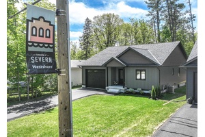 The quality and craftsmanship of this newly constructed bungalow are unmistakable !