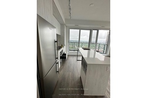Stunning corner high floor unit with amazing south east west lake views !