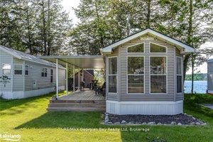 This Waterfront Supreme Cottager Classic Modular Home features 2 bedroom, 1 bathroom and is the ideal space to relax and reconnect with nature.