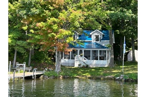 Welcome to The Doll House Cottage, a charming and lovingly maintained retreat located next to the pristine waters of Little Bay on Upper Rideau Lake just a 5 minute boat ...