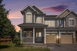 Welcome to this 2 storey END UNIT townhome, ideally situated on an extra wide premium lot.