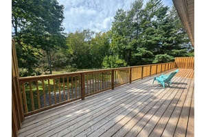 Welcome to this well maintained, year round brick bungalow nestled on a peaceful street in the heart of MacTier.