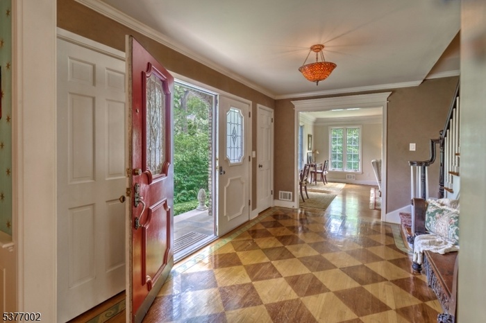 Custom wood floor in entryway