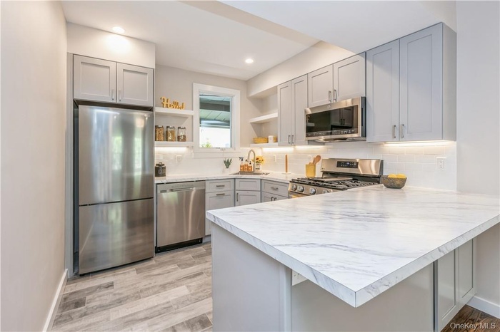 Eat in Kitchen with stainless steel appliances, microwave and dishwasher