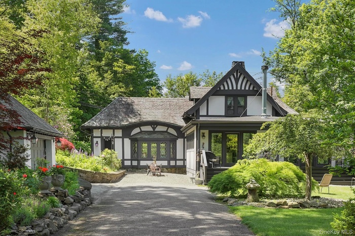 View of home with driveway