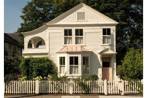 A wonderfully charming c1870 Queen Anne cottage with a detached guest house in the heart of Hudson.