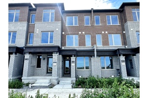 Brand new 4 bedroom rear lane townhome built by Aspen Ridge Homes.