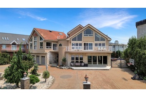 This 7200sq. ft. Spectacular Waterfront home is located at the end of Arbutus Avenue past Nicolosi Drive in the heart of S.