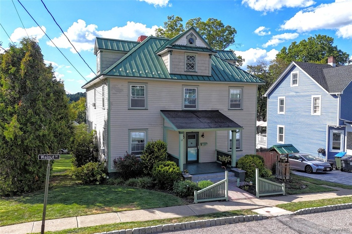 Front view showing covered porch