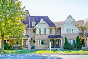 Welcome to this rare double garage townhouse located in a Wismer !
