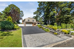 Welcome To This Stunning Fully Renovated Splanch Style Home Nestled on an Interior Street Surrounded by Double Cul De Sac Streets.