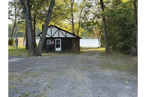 Incredible waterfront property with a gorgeous sandy beach and older cottage in the lovely Buckhams Bay area of Constance Bay.