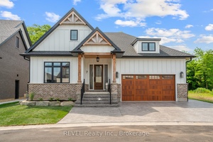 Welcome home to this stunning designer bungalow located in the beautiful wine country of Niagara on the Lake ; in the quaint town of St David's.