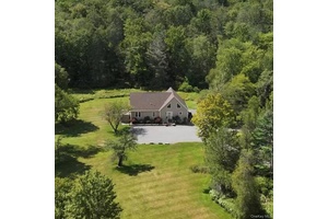 Welcome to 209 Gregory Rd, a contemporary spacious newer construction home designed for entertaining on 6.