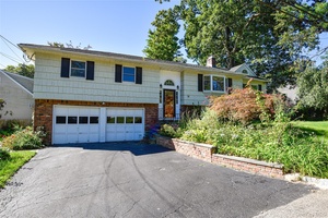 Expanded Hi Ranch Home with Multi Generational Potential This bright and versatile 4 bedroom, 2 full bath hi ranch offers flexible living with potential for a mother daughter or accessory ...