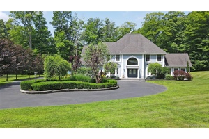 Welcome to this exquisitely maintained residence that exudes timeless elegance and modern sophistication.