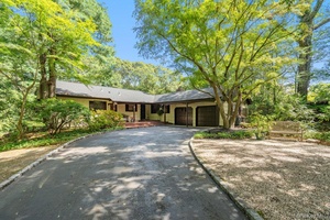 Welcome to this well maintained 4 bedroom, 2 bath sprawling ranch set on 1.