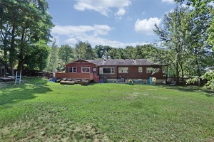 Never listed before. Huge oversized ranch on stunning flat park like property.