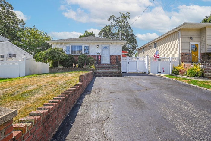 View of front of property with brick siding