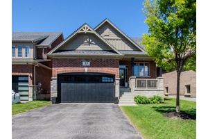 Welcome to this immaculate brick and stone bungalow offering comfort, space, and style in a truly family oriented setting.