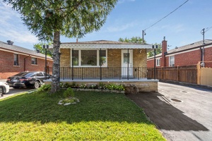 Prime Location ! Fully Renovated 3 Bedroom 3 Bathroom with 3 Kitchens Detached Bungalow in a Sought After Neighborhood !
