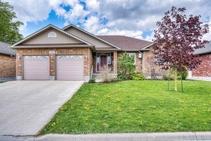 Welcome Home ! Spacious, bright, and move in ready, this Listowel bungalow offers over 1, 900 sq ft on the main floor plus a fully finished basement with an in ...