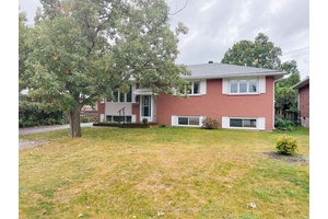 This solid three bedroom brick bungalow offers both comfort and opportunity.