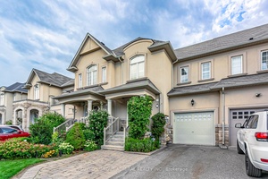This is your rare opportunity to own a freehold executive townhome in the Estate of Credit Ridges, a prestigious Mississauga Road area community located in the Flower Town of Canada.