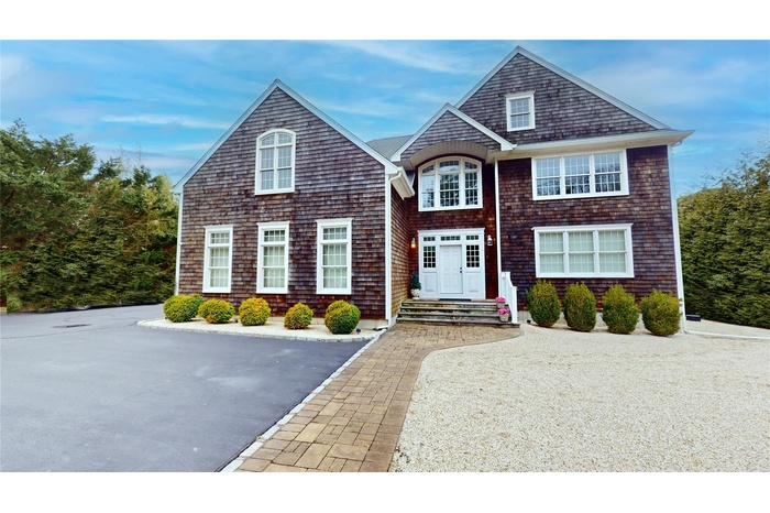 View of shingle-style home