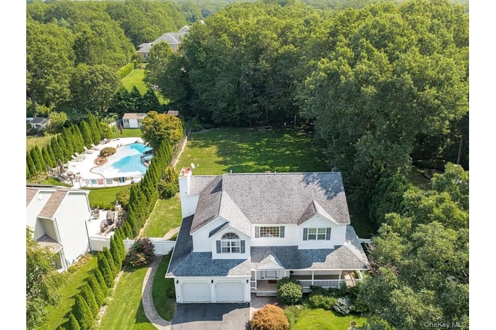 Aerial view of property and surrounding area