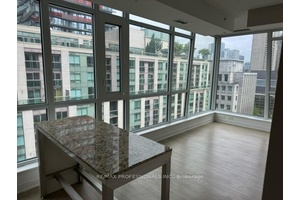 A 2 Bedroom, 2 Bathroom corner unit at the prestigious Studio On Richmond Condo DOWNTOWN TORONTO.