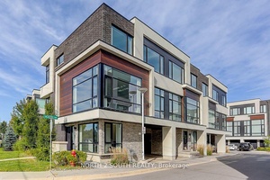 Beautifully upgraded end unit townhouse featuring approx.