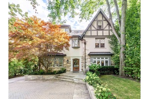 This classically traditional Forest Hill home exemplifies incomparable elegance and modern luxury, boasting five spacious bedrooms and six exquisitely appointed washrooms.