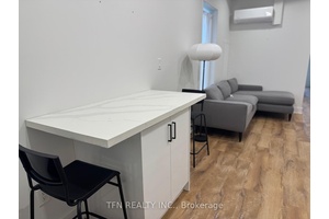 Welcome to this fully renovated 2 bedroom plus a sunroom apartment in the heart of Torontos vibrant Dundas West neighborhood.