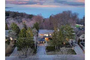 Discover this exceptional lake view residence, where contemporary design meets serene natural beauty.