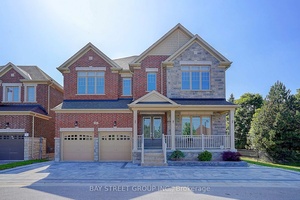 Rarely Offered ! Elegant 50 Ft Detached Home with Double Garage in Prestigious Gated Community of Aurora.