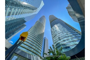 Step into luxury with this designer furnished, move in ready bachelor suite boasting sweeping southeast views of Lake Ontario !