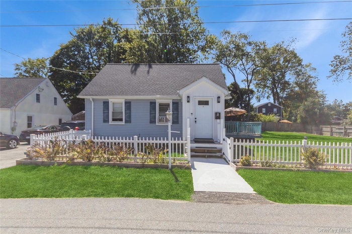 Welcome to this lovely Cape Cod Style Home! This home features a fenced front yard, a newer roof, all on 1/3 of an acre.