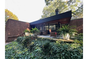 This mid century modern masterpiece boasts an abundance of character with its clerestory windows that flood the interior with natural light.