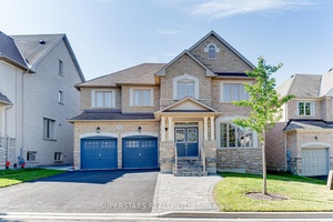 Welcome To This Beautifully Designed Double Car Garage Detached Home Featuring Luxurious Stone Front And Double French Doors.