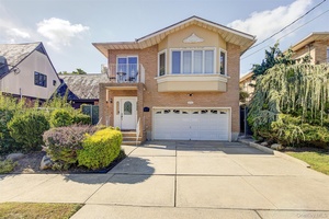 Welcome to this stunning custom built Hi Ranch in prime Beechhurst, designed with a versatile mother daughter layout perfect for multi generational living.