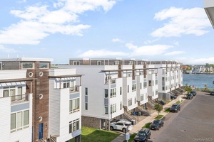 Discover beach side living in this luxury 2 family townhouse complex situated on the beach.