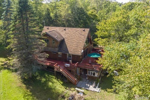 Discover this charming three bedroom, two bathroom Cedar Cabin nestled in scenic Roscoe.