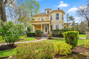 Experience the perfect blend of historic charm and contemporary comfort in this exceptional Edgewood Victorian, nestled on a beautifully landscaped double lot totaling 0.