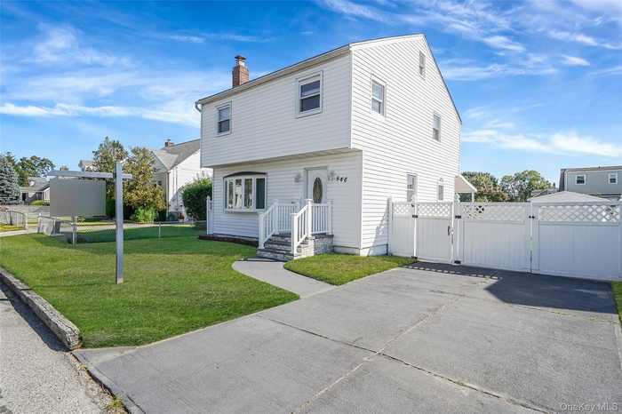 Charming & Beautifully Maintained Colonial Located In The Heart Of Lindenhurst Village!